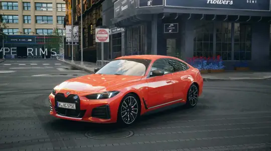 593 силы и цвет от Ferrari: BMW представила i4 M60 в Rosso Corsa