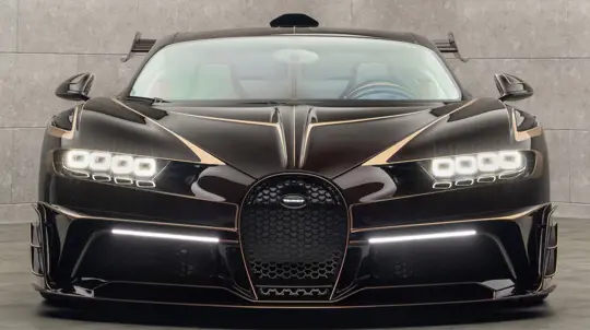 Шесть выхлопных труб и коричневый карбон: Mansory добралась до Bugatti Chiron